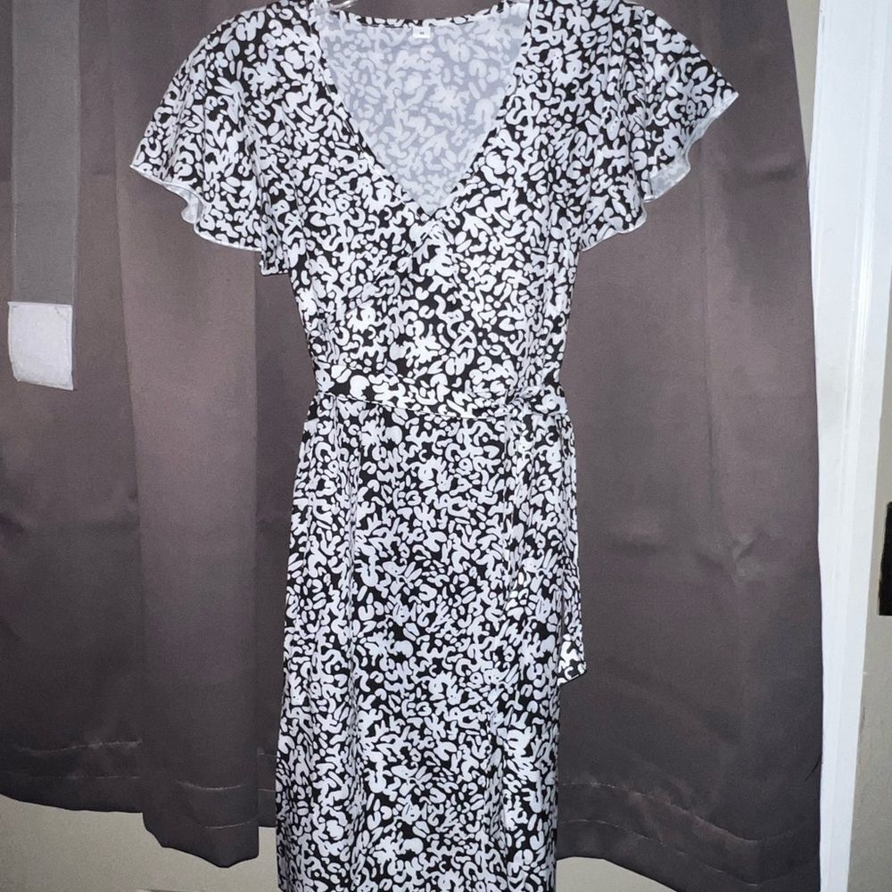 New in package black & white dress size med